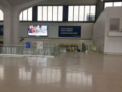 Inside pick up point at flight arrival for EWR Limo 